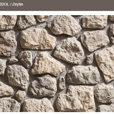 Doğal zeytin tonlarında, tek tek döşenen düzensiz kültür taşı.